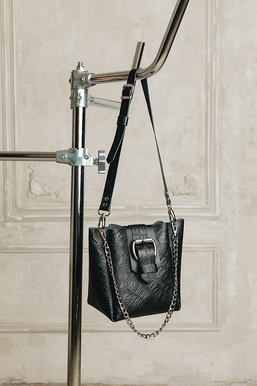 "Missing" shoulder bag