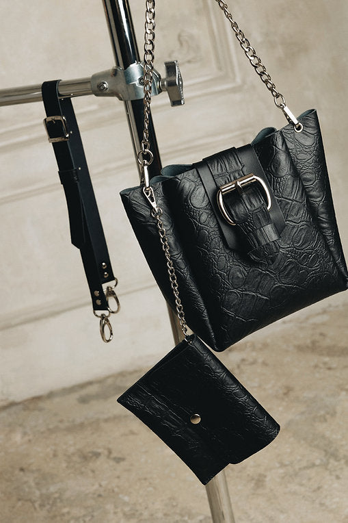 "Missing" shoulder bag